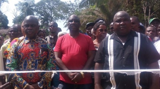 From left: Speaker Emmanuel Nuquay, Internal Affairs Minister Henrique Tokpa, Rep. George Mulbah cutting the ribbon for the Kayata Road.Â  Photo: Moses Bailey