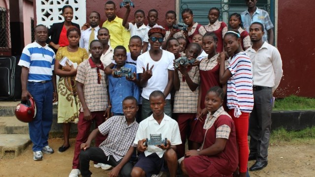 Teachers and students pose at the Worldwide Academy campus. Photo: Jefferson Krua