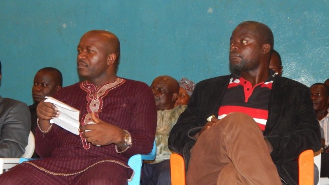 Lawrence Sua (Right) seated along with former Foreign Affairs Minister, Augustine Kpehe Ngafuan (Left) at the students induction Ceremony of the Ganta United Methodist High on January 16, 2016. Photo: Arrington Ballah