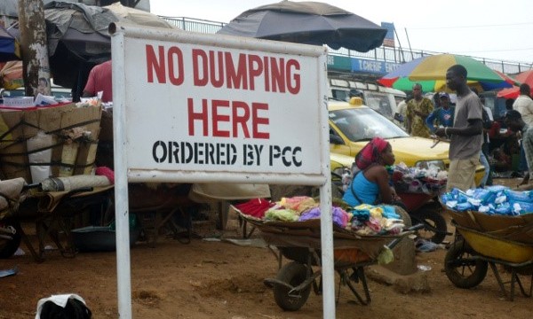 A billboard restricting marketers from dumping. Photo: Zeze Ballah